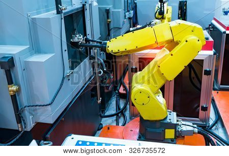 Automation system control application on automate robot arm in smart manufacturing background.