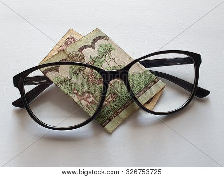 Investment And Promotion For A Better Vision, Nepalese Banknote Of Ten Rupees And Black Plastic Fram