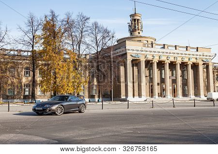 Novosibirsk, Russia - 10.09.2019: A Rare Japanese Sports Car In The Back Of A Gray Toyota Supra Coup