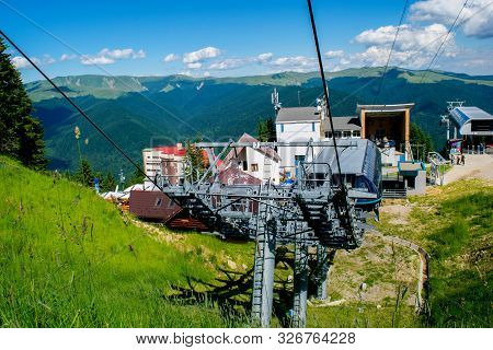 Sinaia, Prahova, Romania - June 29, 2019: View Of Cable Car Gondola Pillars Installation In Sinaia 1