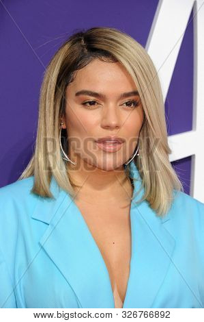 Karol G at the Los Angeles premiere of 'The Addams Family' held at the Century City AMC in Century City, USA on October 6, 2019.