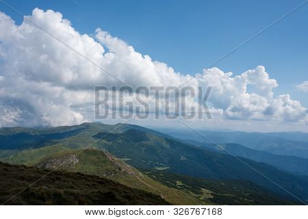 Summer Landscape In The Carpathian Mountains. View From The Mountain Peak Hoverla. Ukrainian Mountai