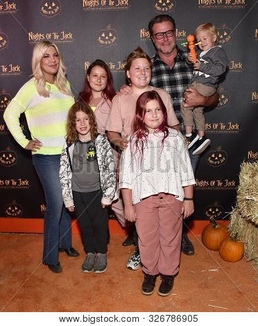 LOS ANGELES - OCT 02:  Tori Spelling, Dean McDermott, Stella, Liam, Hattie, Finn and Beau McDermott arrives for Nights of the Jack VIP Preview on October 02, 2019