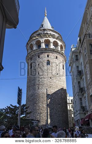 Istanbul, Turkey - July 26, 2019: Galata Tower At The Center Of City Of Istanbul, Turkey