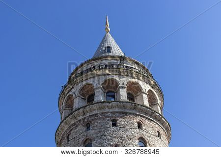 Istanbul, Turkey - July 26, 2019: Galata Tower At The Center Of City Of Istanbul, Turkey