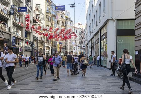 Istanbul, Turkey - July 26, 2019: Walking People At The Pedestrian Street Near Taksim Square At The 