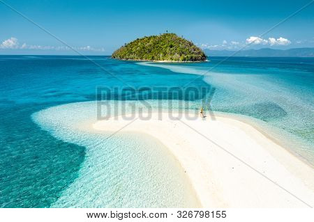 A Concept Of Freedom. Happy Woman Standing On A Spectacular White Beach