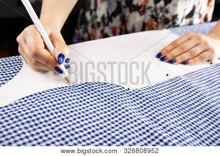 Clothes Designing. Redrawing The Template On The Material