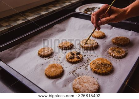 Woman Glazing Scones With Brush Ready To Go In The Oven