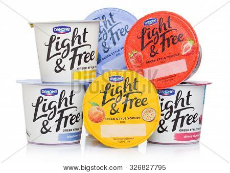 London, Uk - October 10, 2019: Cups Of Danone Light & Free Greek Style Natural Yogurt Different Tast