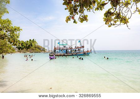 Ko Samet, Thailand - Jan 1, 2010: Local People On A Boattrip Enjoy The Clear Water And Beach In Ko S