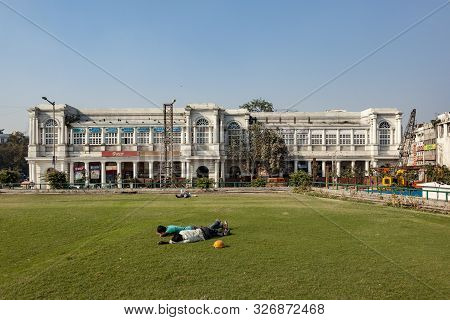 New Delhi, India - Nov 17, 2011: People Rest At Connaught Place. It Is One Of The Largest Financial,