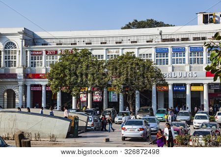 Delhi, India - Nov 17, 2011: People At Connaught Place. It Is One Of The Largest Financial, Commerci