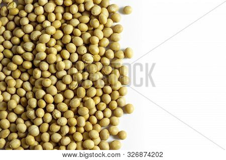 A Pile Of Dried Soybeans On White Background