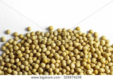 A Pile Of Dried Soybeans On White Background