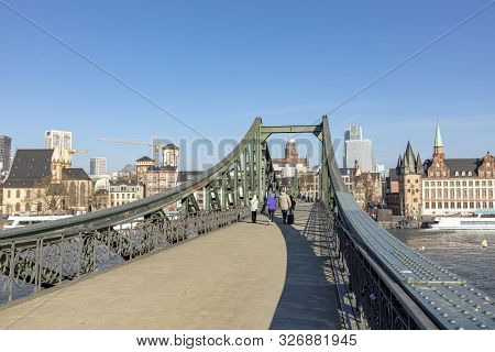 Frankfurt, Germany - Feb 24, 2018: Iron Bridge, Eiserner Steg, Iron Footbridge Is Footbridge Leading