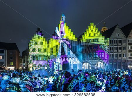 Frankfurt, Germany - Mar 23, 2018: People Watch The Open Air Light Spectacle Luminale In Frankfurt. 