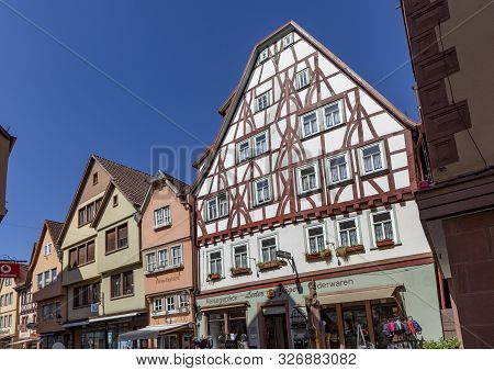 Wertheim, Germany - Apr 6, 2018: People Visit The Pedestrian Zone Of The Scenic Medieval Village Of 