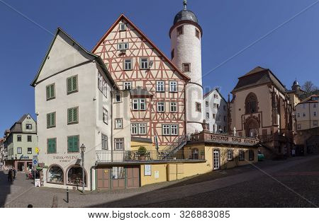 Wertheim, Germany - Apr 6, 2018: People Visit The Pedestrian Zone Of The Scenic Medieval Village Of 