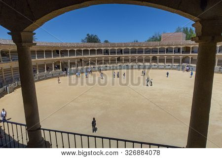 Ronda, Spain - May 17, 2018:  Visitors To The Plaza De Toros Or Bullring. The Bullring At Ronda Is T