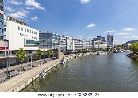 Saarbruecken, Germany - Aug 5, 2018: Empty Promenade At The River Saar In Saarbruecken. Ships Anchor