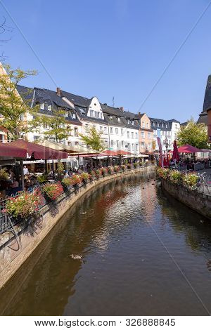 Saarburg, Germany - Aug 28, 2018: City Center Of Saarburg With Creek And Restaurants At The Promenad