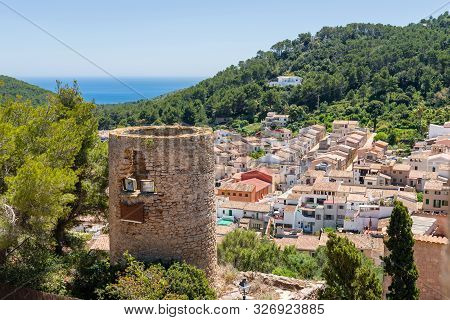 Old Tower With Historic City Of Capdepera Seen From Capdepera Castle Located In The East Of Majorca,