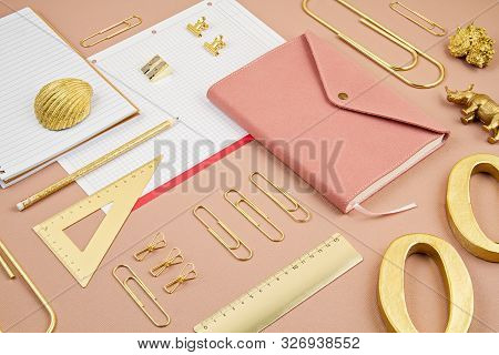 Top View Over Notepad And Golden Office Suplplies. Working Space, Studies, Office Desk, Home-office 