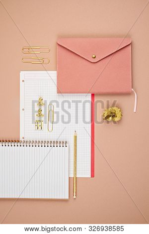 Top View Over Notepad And Golden Office Suplplies. Working Space, Studies, Office Desk, Home-office 