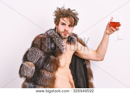 Guy Attractive Rich Posing Fur Coat On Naked Body. Rich Athlete Enjoy His Life. Fashion And Pathos. 