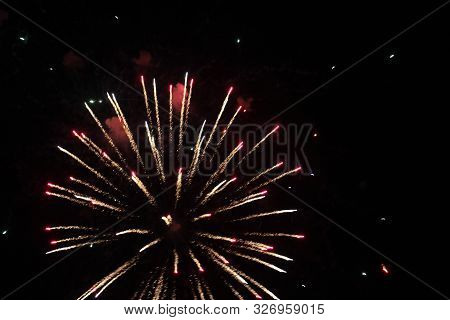 Gold And Red Fireworks Celebration Painting The Night Sky