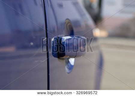 The Side Of The Car Is Blue