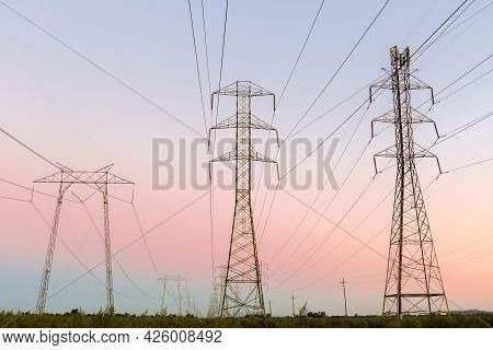 High Voltage Power Lines With Twilight Skies In Central California. Dixon, Solano County, California
