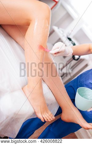 Cosmetology Procedure For Hair Removal From The Master Of Laser Hair Removal In A Cosmetic Spa Clini