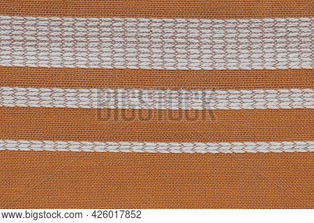 The Texture Of The Fabric Made Of Cotton With A Pattern.