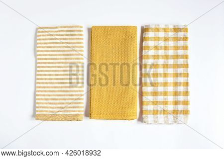Top View New Kitchen Towels In Yellow Canary Or Dendelion,strip And White Color Simple Pattern In Di