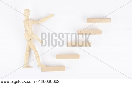 Wooden Men Walking Up Stairs ,to Career Ledder, Business