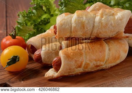 Sausage Buns. Soft Baked Bun (dough )stuffed With Pork Sausage For Fast Food Breakfast Or Coffee Bre