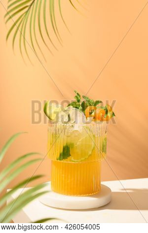 Tropical Cocktail Or Freshness Orange Lemonade, Mai Tai On Modern Still Life With Podium On Beige Ba