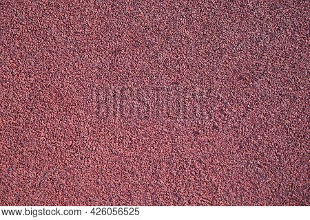 Closeup Of Red Rubber Floor Covering For Playground