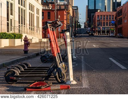 Nashville, Tennessee - 28 June 2021: Spin Electric Scooter On Roadside Near Broadway And Downtown En