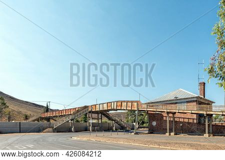Touws River, South Africa - April 20, 2021: Rusted Pedestrian Railroad Bridge In Touws River In The 