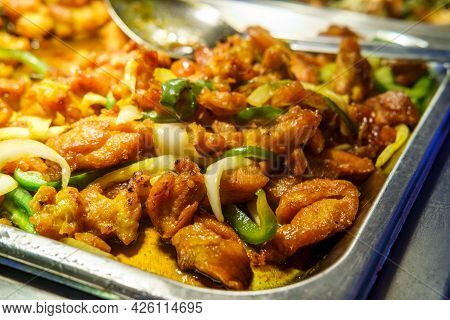 Chinese Food Buffet Self Service Teriyaki Chicken With Green Bell Peppers