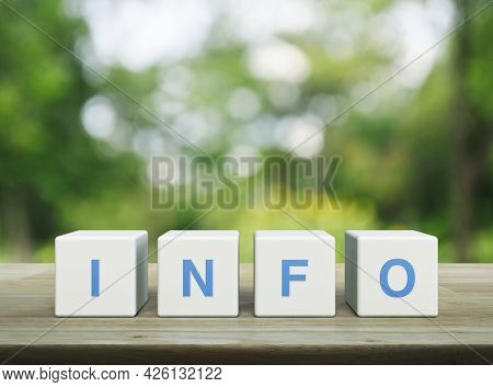 Info Letter On White Block Cubes On Wooden Table Over Blur Green Tree In Park, Business Customer Ser