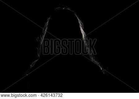 Anonymous Woman Hiding Face And Identy In The Dark Shadow