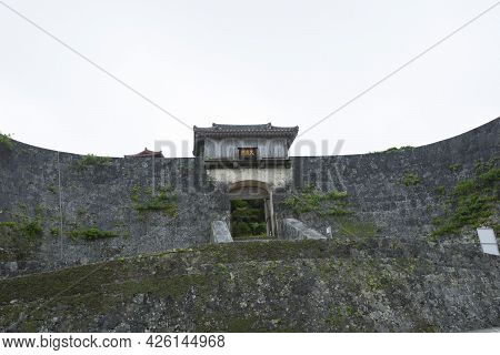 Kyukeimon Gate At Shuri Castle In Okinawa. Japanese Kanji Characters Translate As \