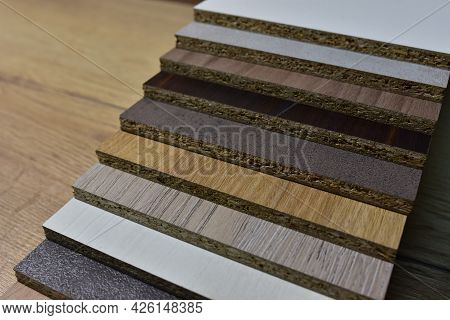 Samples Of Fibreboard Panels With Wood Texture. Laminated Cpd. Chipboard Pvc Edge. Wooden Furniture 