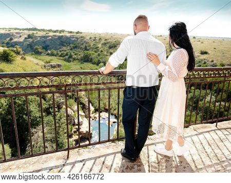 Wedding Romantic Couple Man And Woman Looking On River, Hills, Skyline Standing On Brige At Summer S