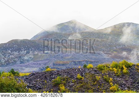 Mountainside With Zip Wire Launching Site, In Cloud.