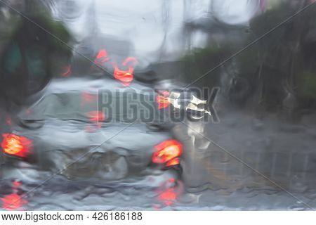 Abstrack And Blur Images Of Cars Driving On The Road While Raining, To Transportation And Rainy Seas